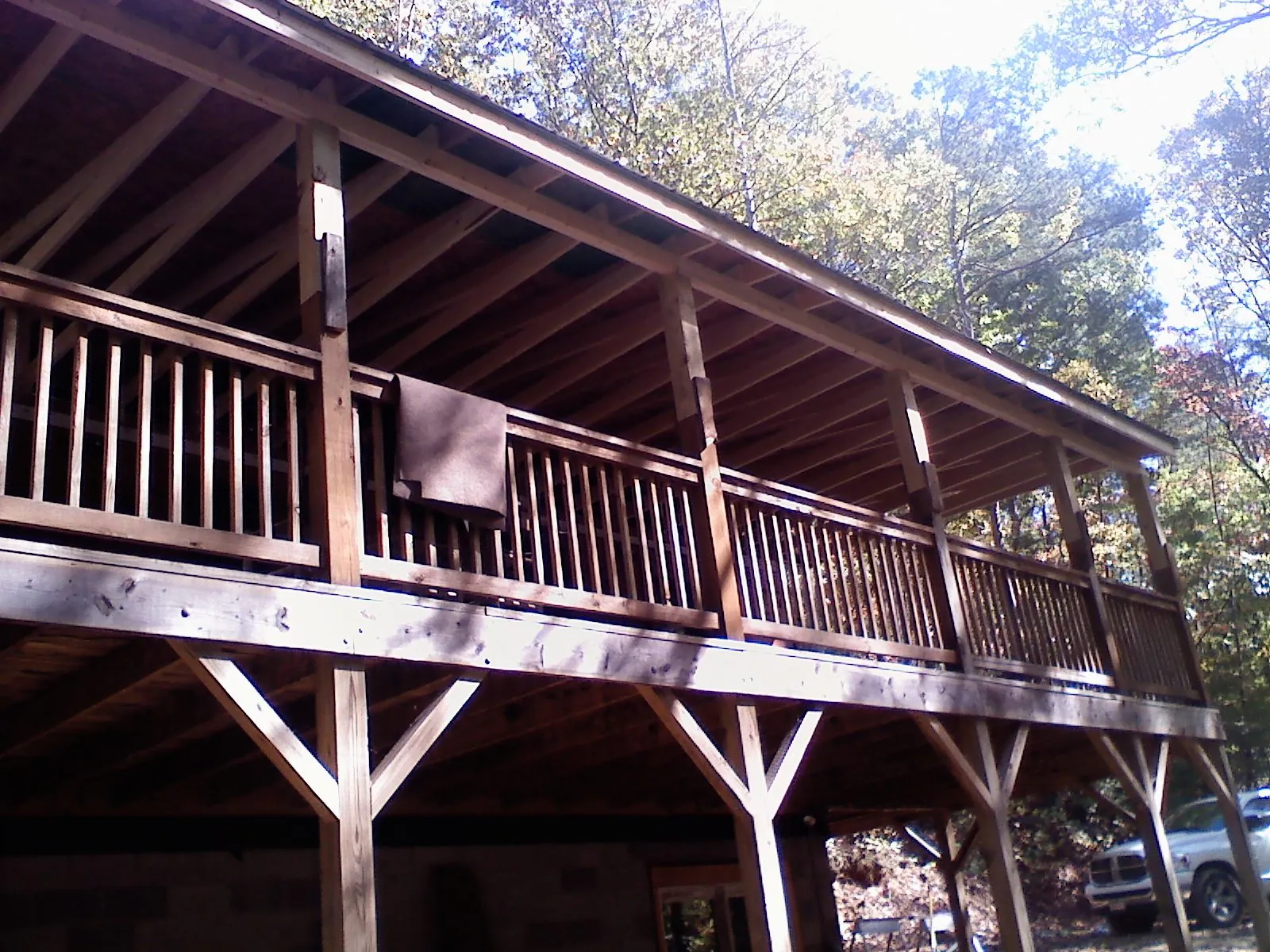Timber framing under a new elevated porch and deck — Roof Leak Repair in Plantation by Roofing Brothers